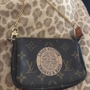 LV trunks and bags stamped mini pochette